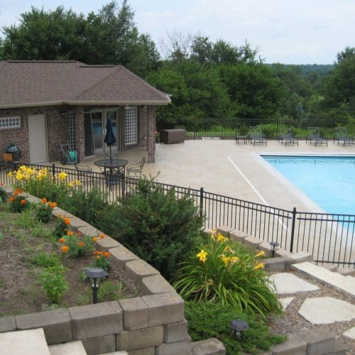 Pool-house-that-opens-up-to-concrete-pool-Iowa-City-Iowa-scaled.jpg
